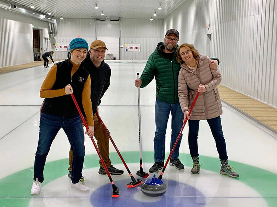 Traverse Traveler team curling at Broomstack with Leelanau Curling Club